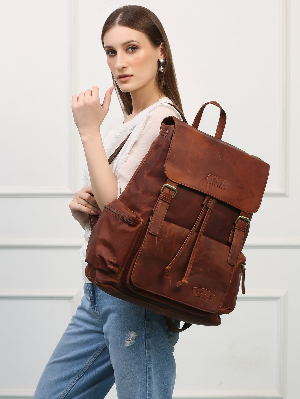 Brown Leather Backpack - Rahul Makin's Signature Monogram | Stylish, Travel Ready, and Accessible