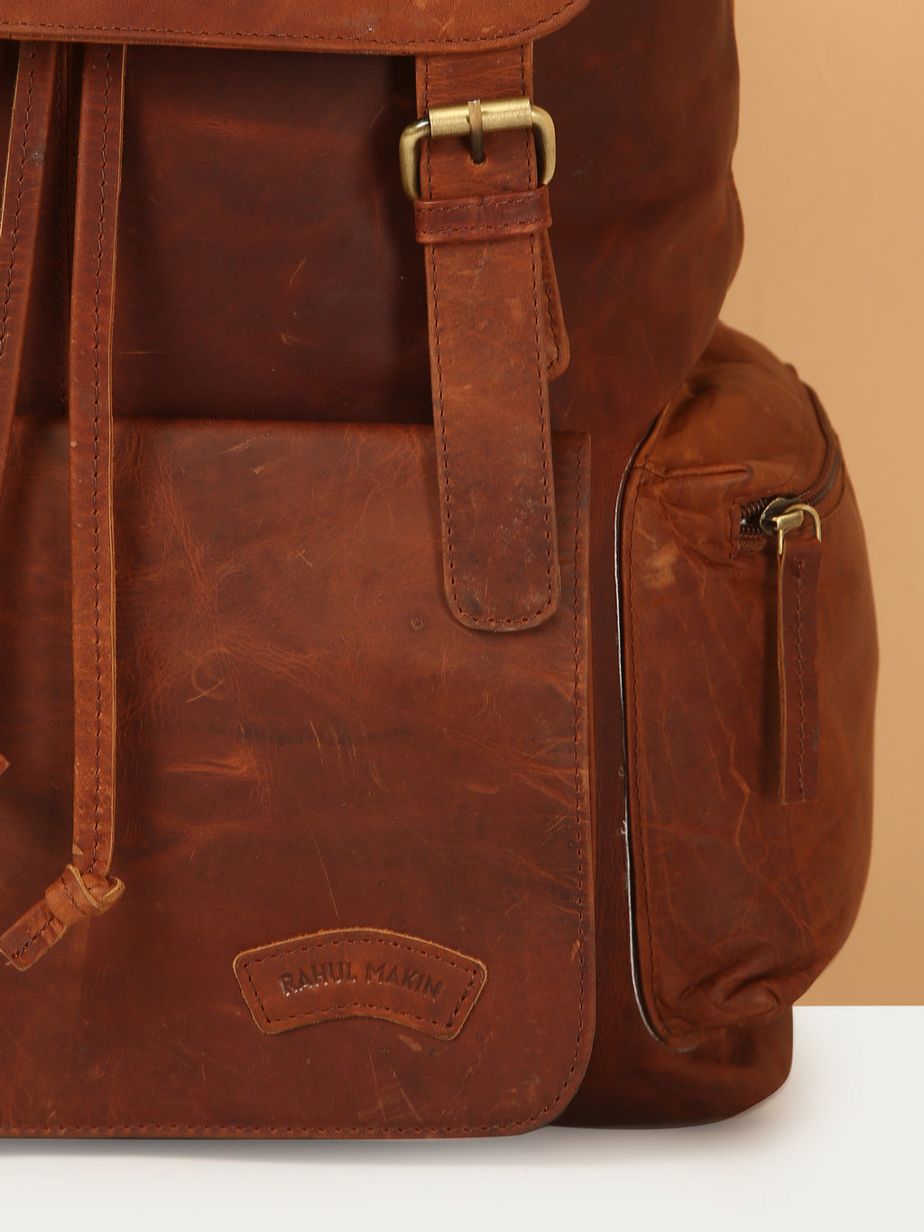 Brown Leather Backpack - Rahul Makin's Signature Monogram | Stylish, Travel Ready, and Accessible