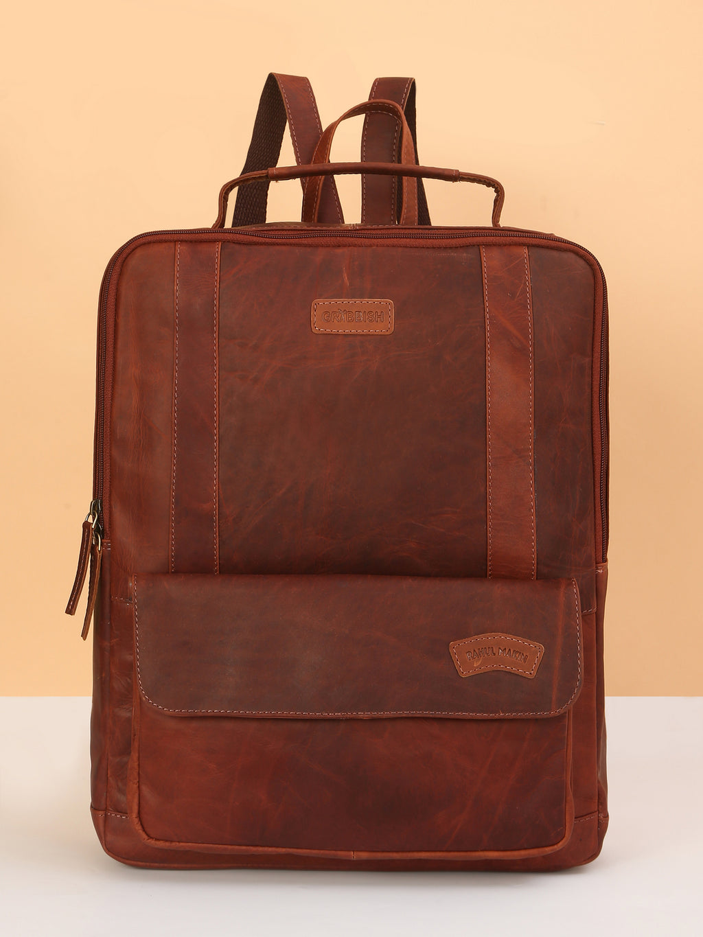 Brown Leather Backpack – Rahul Makin's Signature Monogram Edition | Stylish, Compact & Everyday Ready
