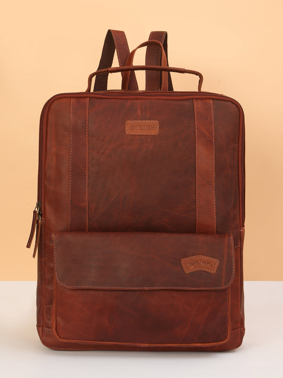 Brown Leather Backpack – Rahul Makin's Signature Monogram Edition | Stylish, Compact & Everyday Ready