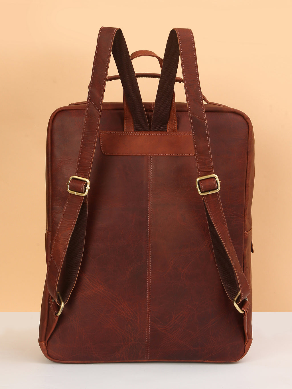 Brown Leather Backpack – Rahul Makin's Signature Monogram Edition | Stylish, Compact & Everyday Ready