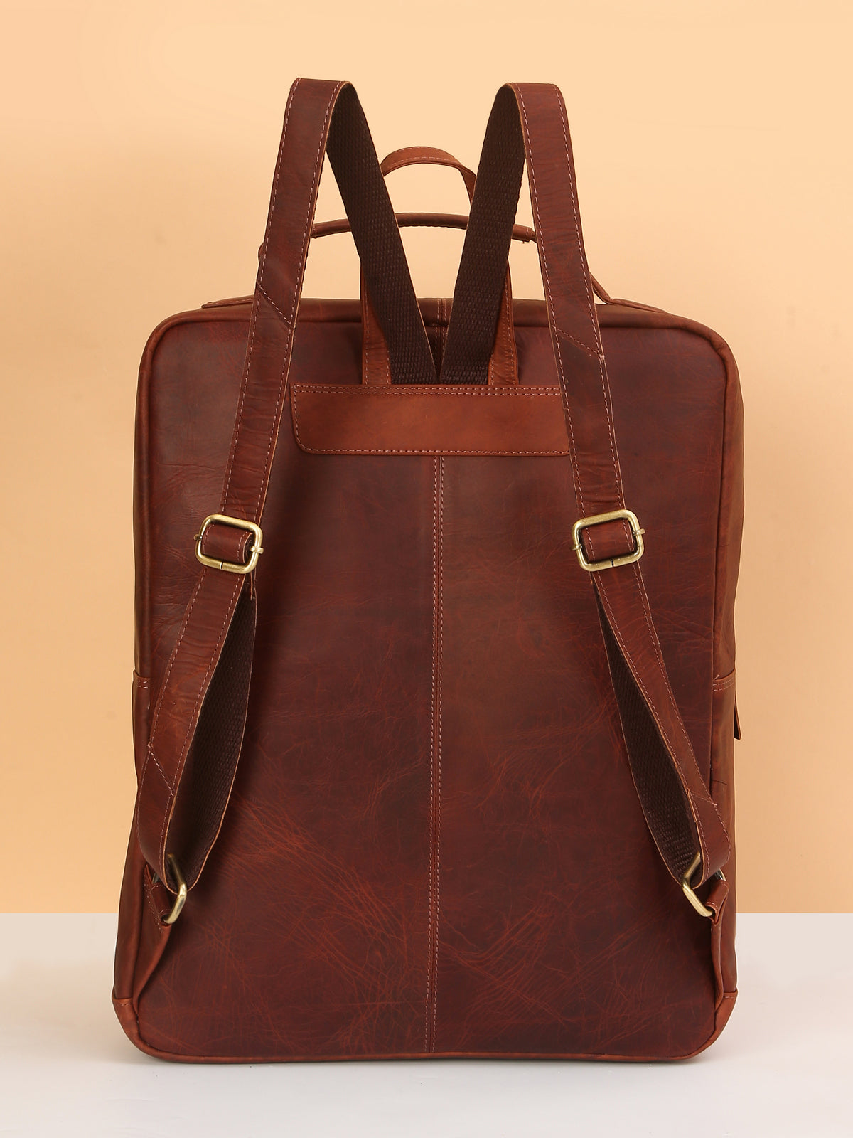 Brown Leather Backpack – Rahul Makin's Signature Monogram Edition | Stylish, Compact & Everyday Ready