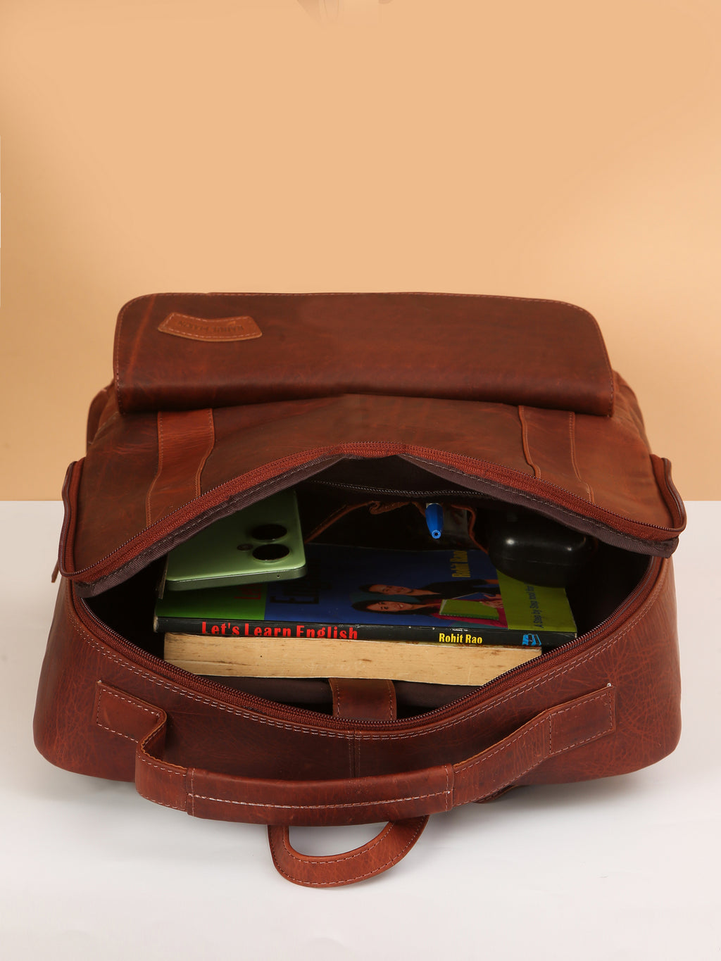 Brown Leather Backpack – Rahul Makin's Signature Monogram Edition | Stylish, Compact & Everyday Ready