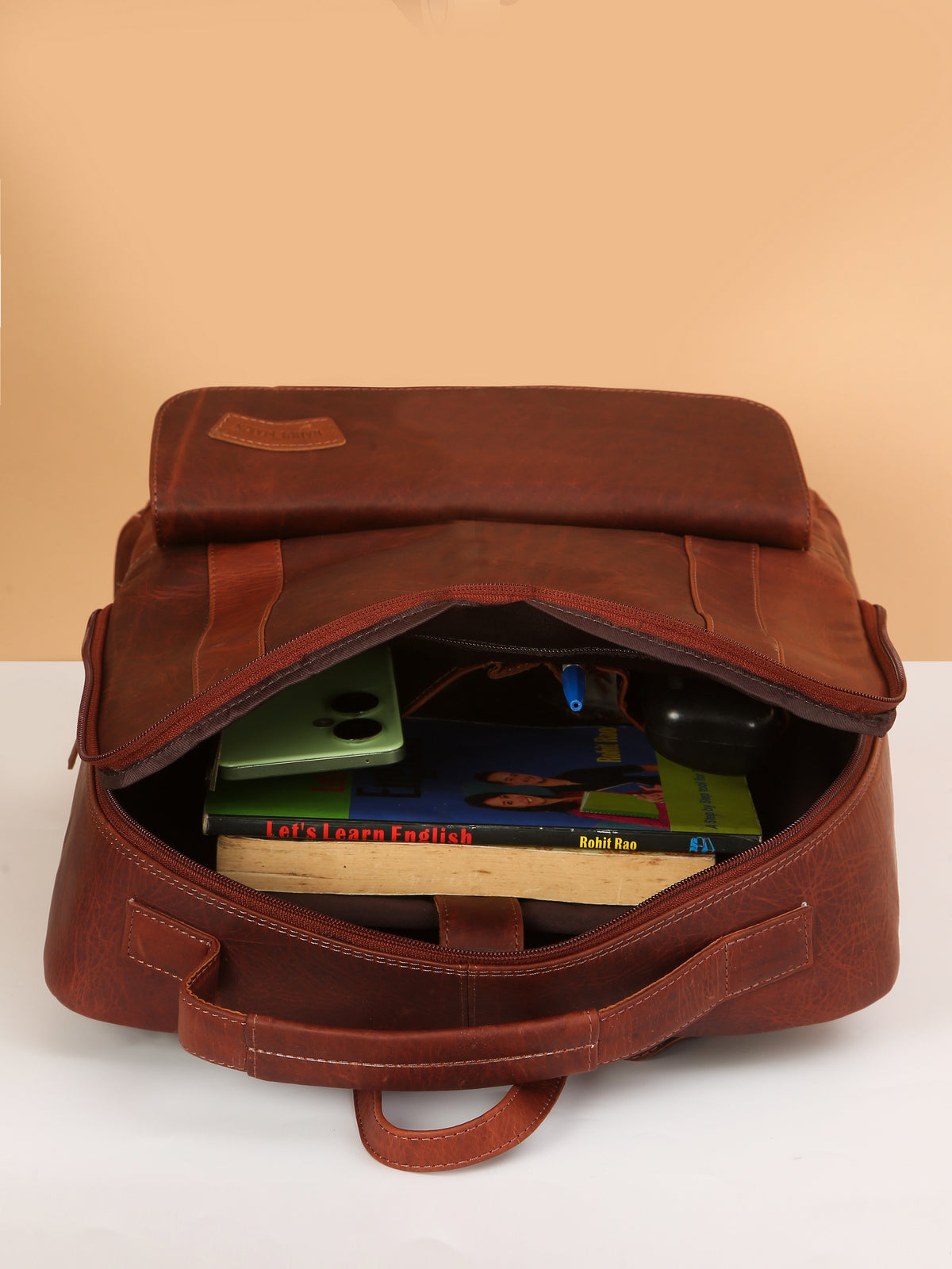 Brown Leather Backpack – Rahul Makin's Signature Monogram Edition | Stylish, Compact & Everyday Ready